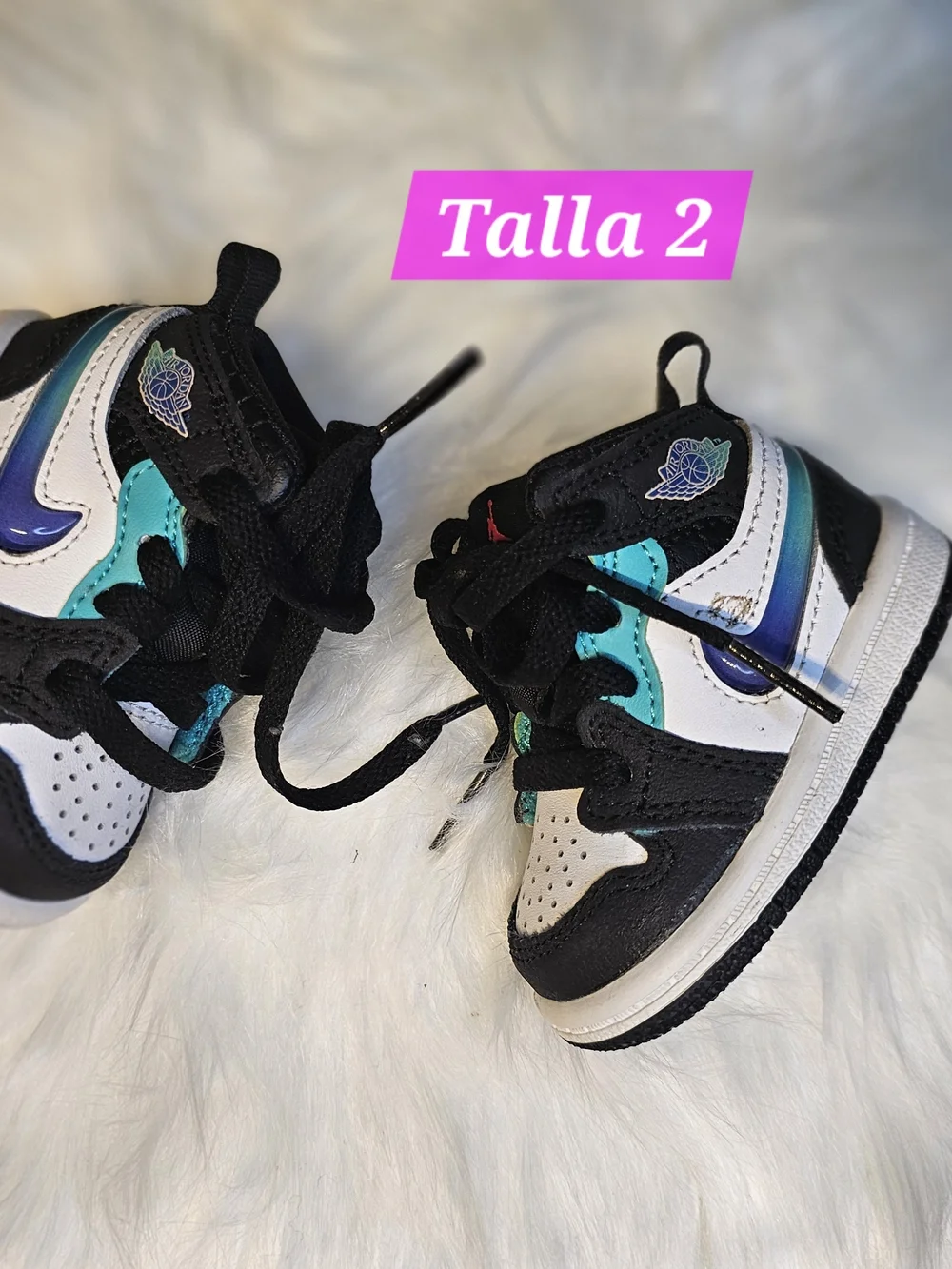 Nike Toddler Black and White High-Top Sneaker with Pink Logo